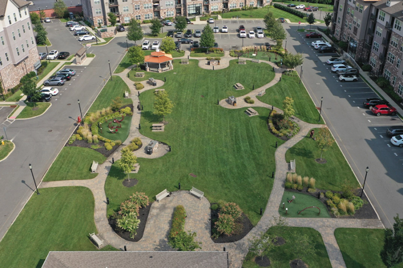 Aerial view of impeccably maintained and pristine park concept image for the benefits of preventive maintenance
