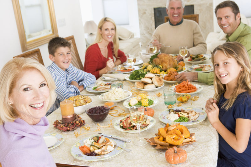 Family eating dinner together during holidays. Many businesses whether a small business or a large one needs help decorating special events for family customers. We make sure that our designers have gone through our official training.