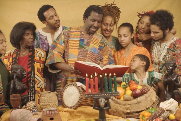 African family celebrating Kwanzaa at their own home. What makes our decorating services business stand out is that we help all from small businesses to big ones with their decoration needs. You can also check pictures of our work from our business online.