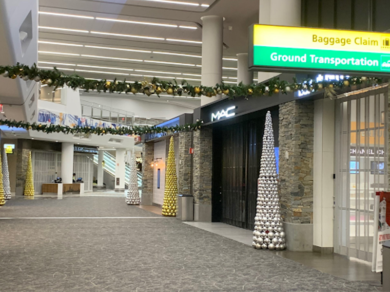 Christmas airport decor on columns and hallways