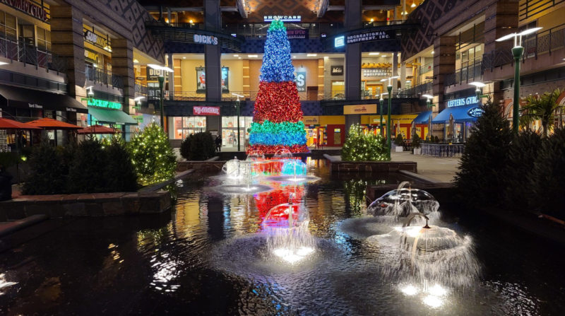 holiday display of a multicolored christmas tree at a mall